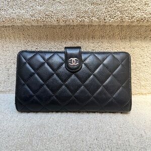 Chanel Lambskin Large Size Wallet with snap and exterior zipper in Black